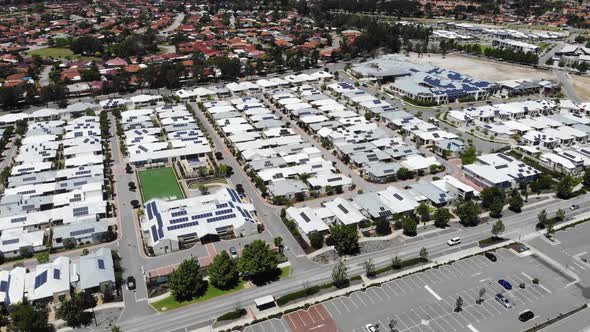 Aerial View of Houses with Solar Panels