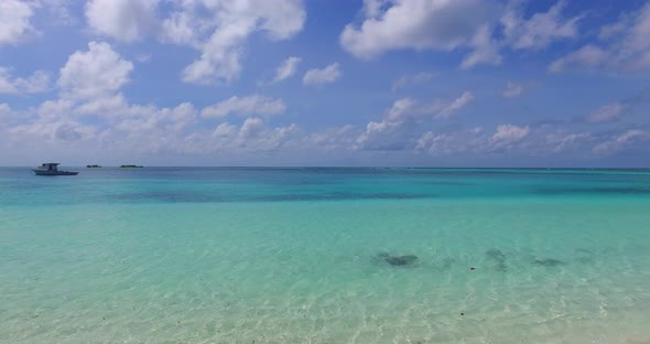 Tropical drone clean view of a white paradise beach and aqua turquoise water background in vibrant 4