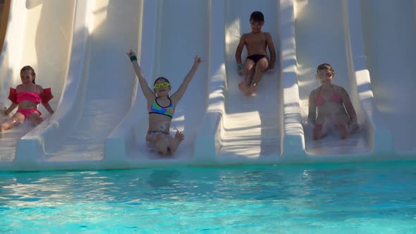 Funny Boys and Girls Roll Water Slides