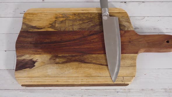 Grated Organic Orange Carrots on a Wood Cutting Board