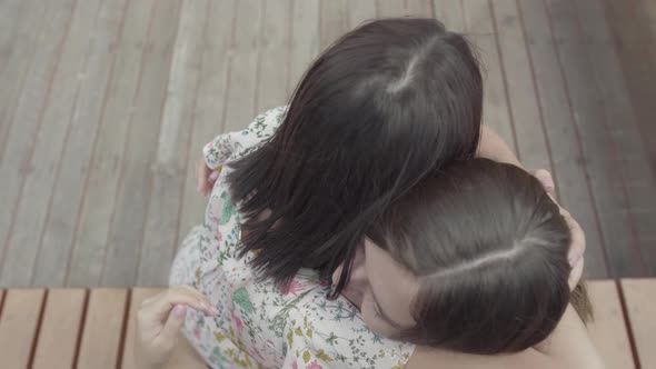 The Sad Crying Woman Telling Her Story To Her Friend Sitting Outdoors