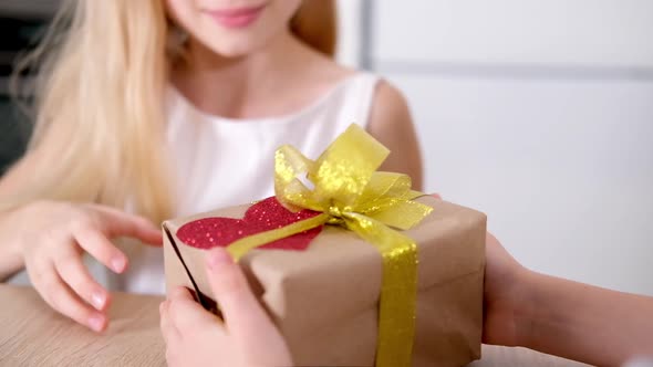 Little Boy Gives His Beloved Girl Valentines Day Gift Box