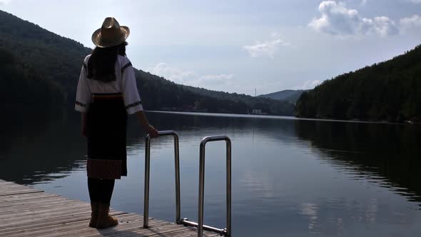 Romanian girl on the lake pontoon - Valiug, Romania 2