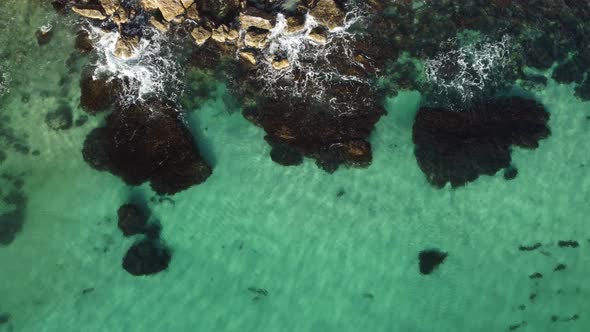 Aerial Panoramic View of Seascape with Crystal Clear Azure Sea and Rocky Shores