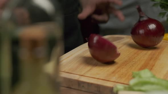 Professional Chef Cuts Red Onion