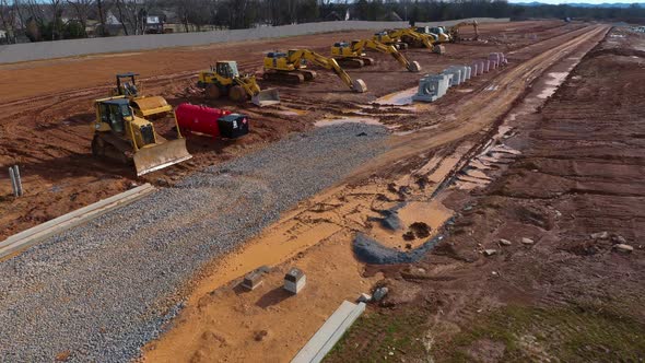 Heavy Construction Equipment in Mud on Job Site