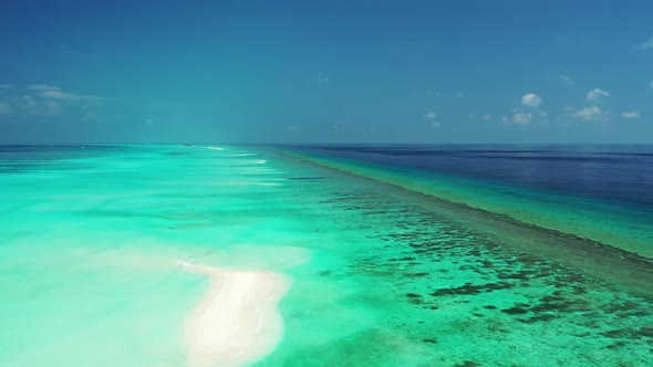 Aerial drone view landscape of exotic resort beach trip by blue sea and white sand background of a p