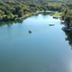 Fishing Boat on a Suburban American Lake Drone Areal View - VideoHive Item for Sale