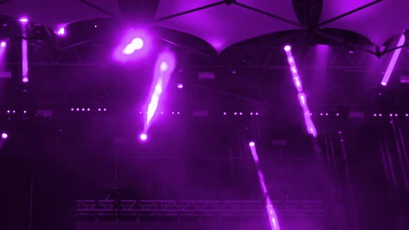 Spotlights on Stage During the Concert alt