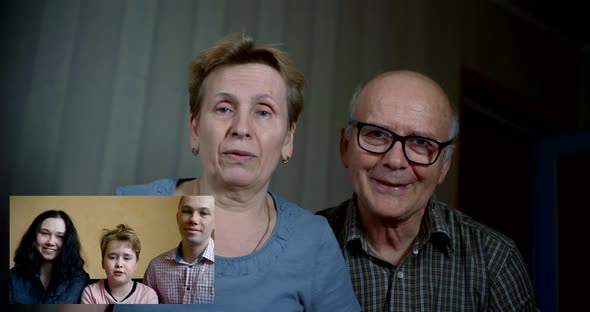 Video Communication on the Self-isolation of the House, an Elderly Couple Call on the Phone with