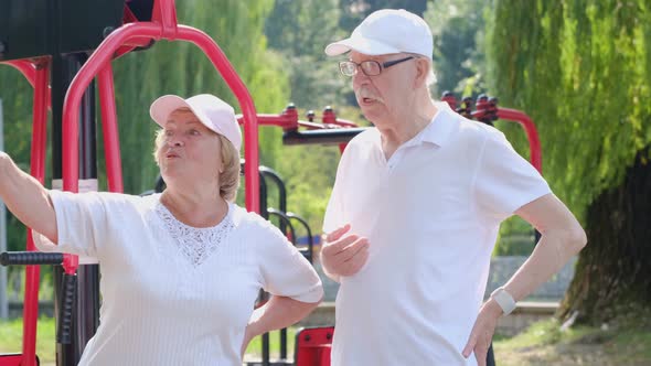 Happy Retirees Spend Time on the Sports Field