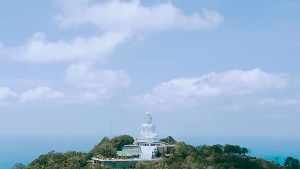 Hyperlapse of White Buddha Statue in Thailand Standing on the Top of Mountain