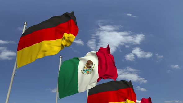 Waving Flags of Mexico and Germany