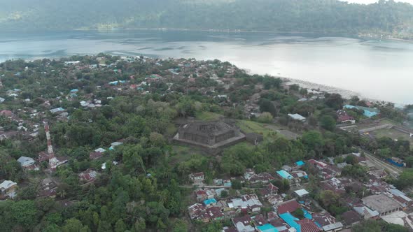 Aerial: flying over Bandaneira village Fort Belgica Indonesia Banda Islands