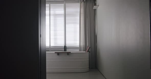 Transparent Sliding Door Closed Inside the Modern Bathroom Minimalist Bathtub