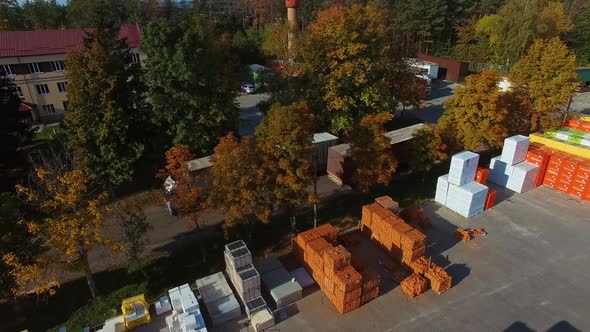 Large distribution warehouse. Aerial view of building materials warehouse