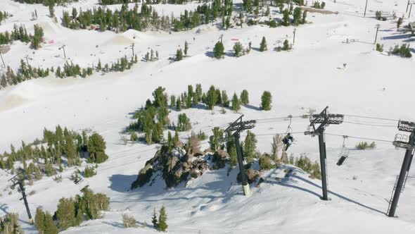 Aerial View Lifts at Mammoth Mountain People Riding Ski Chairs in Ski Resort