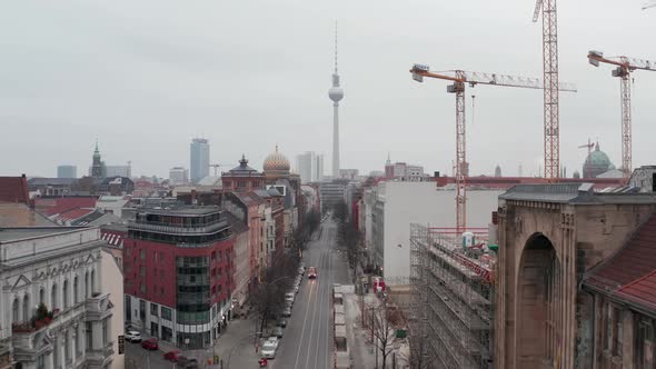 AERIAL: Slow Flight Through Empty Central Berlin Neighbourhood Street with Cathedrals and View on