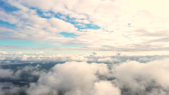 Aerial view white clouds in the sky in motion. Panoramic view. Fast playback