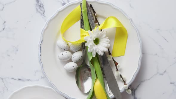 Spring Easter Table Setting at White Marble Table. Top View