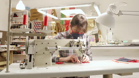 Skillful Female Tailor Creating Medical Protective Mask