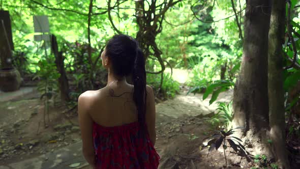 Cute Asian Girl Walking Towards a Bridge in Hot Spring in Slow Motion Thailand