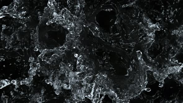Super Slow Motion Shot of Splashing Water Isolated on Black Background at 1000 Fps alt