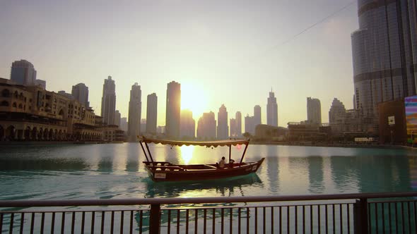 A motorboat sailing in Burj Khalifa Bay, Dubai