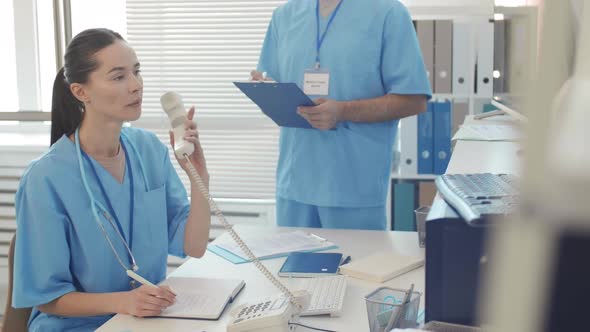 Two Doctors Working in Office