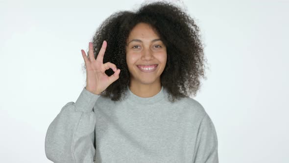 African Woman with OK Sign, White Background 
