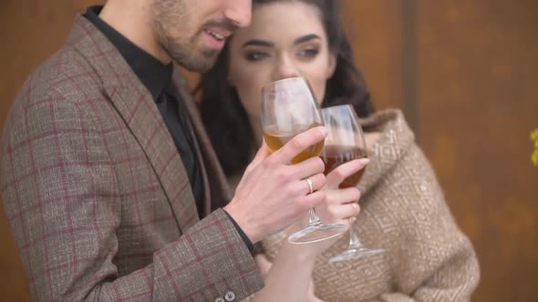 Couple with Glasses of Wine