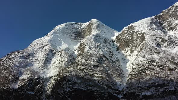 Mountain view from unesco listed naeroyfjord close to Gudvangen Norway - Aerial looking up at mounta