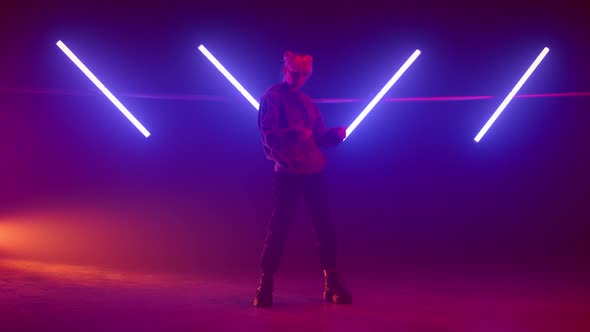 Cool Woman Wearing Hood Preparing Dance Performance on Night Club Stage