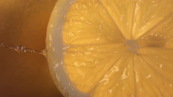 Rolling Half of Fresh Lemon and Opening the Inside of the Fruit in Slow Motion