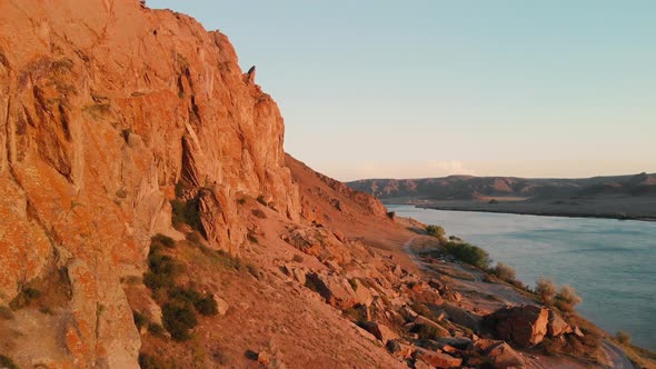 Drone Shot of River and Mountains at Sunset in Kazakhstan