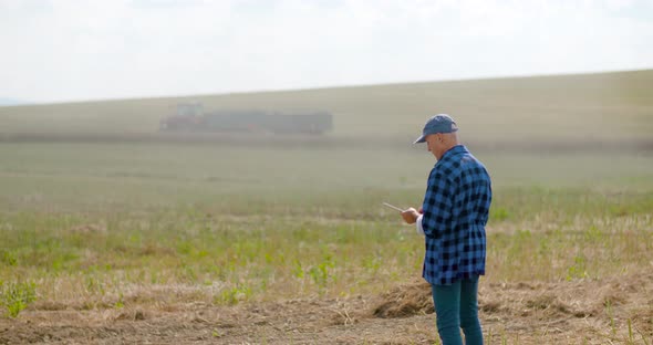 Farmer Using Digital Tablet Agriculture