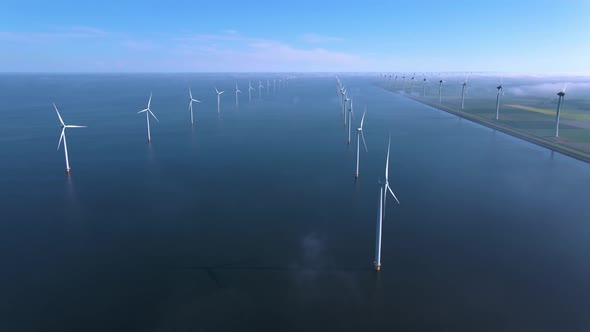 Wind Turbines in the Early Morning Wind Mill Park in the Netherlands