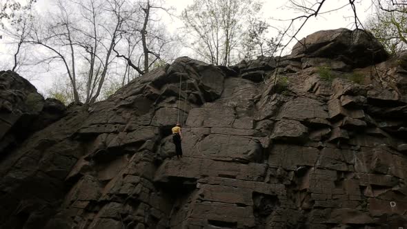 Rock Climber Reaches Top