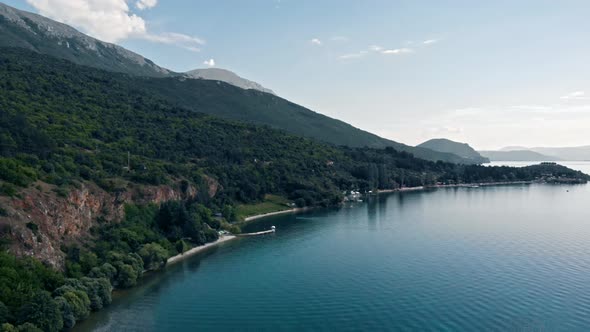 Aerial shot of Macedonia coast. Clif and beautiful water around Ohrid Lake in Southern Europe.