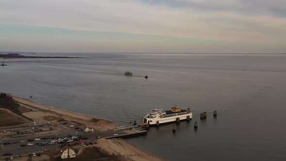 an aerial shot of an Orient Point ferry as it takes on vehicles and passengers. It was a cloudy day