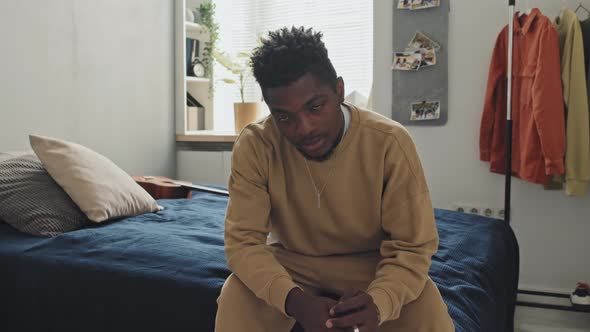 Portrait of African American Man in Bedroom