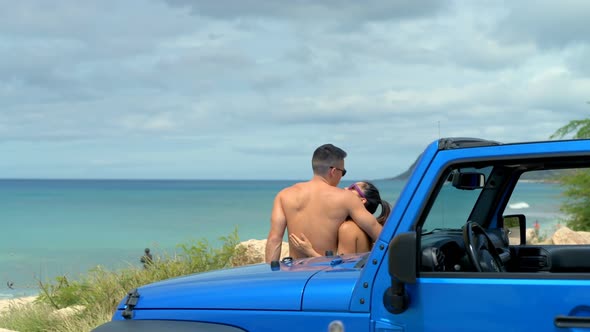 Caucasian couple embracing each other on the beach 4k