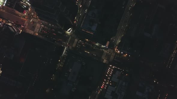 AERIAL Overhead Manhattan Drone Flight at Night with Glowing City Light in New York City
