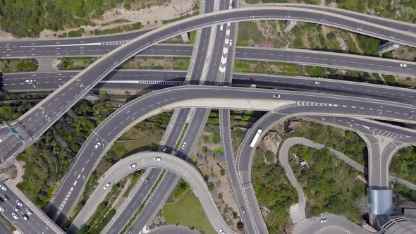 Massive multi level highway interchange with traffic on all routes, Aerial view.