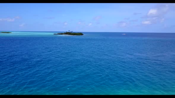 Aerial view sky of tranquil lagoon beach journey by shallow ocean with white sandy background of a d