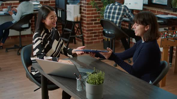 Female Employee and Candidate Greeting at Job Interview Appointment