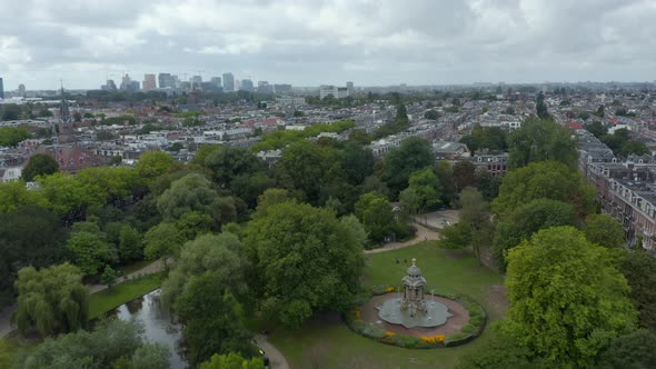 Sarphatipark Public Park in Amsterdam, Forward Aerial on Cloudy Day