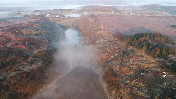 Aerial View of Bonny Glen in County Donegal with Fog  Ireland