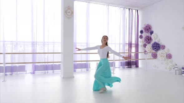 Ballet Dancer is Rehearsing a Dancing Elements