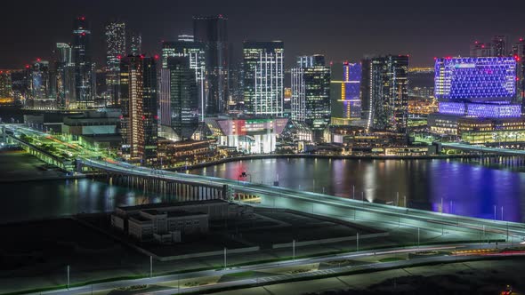 Aerial Skyline of Abu Dhabi City Centre From Above Night Timelapse